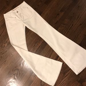 White bell bottom premium denim wear.
